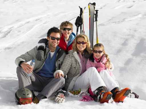 Young Family On Ski Vacation