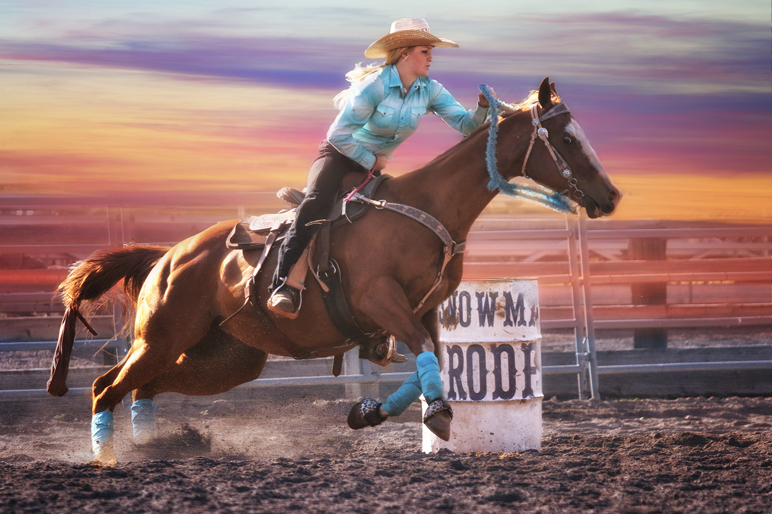 Woman riding a horse with a sunset in the background