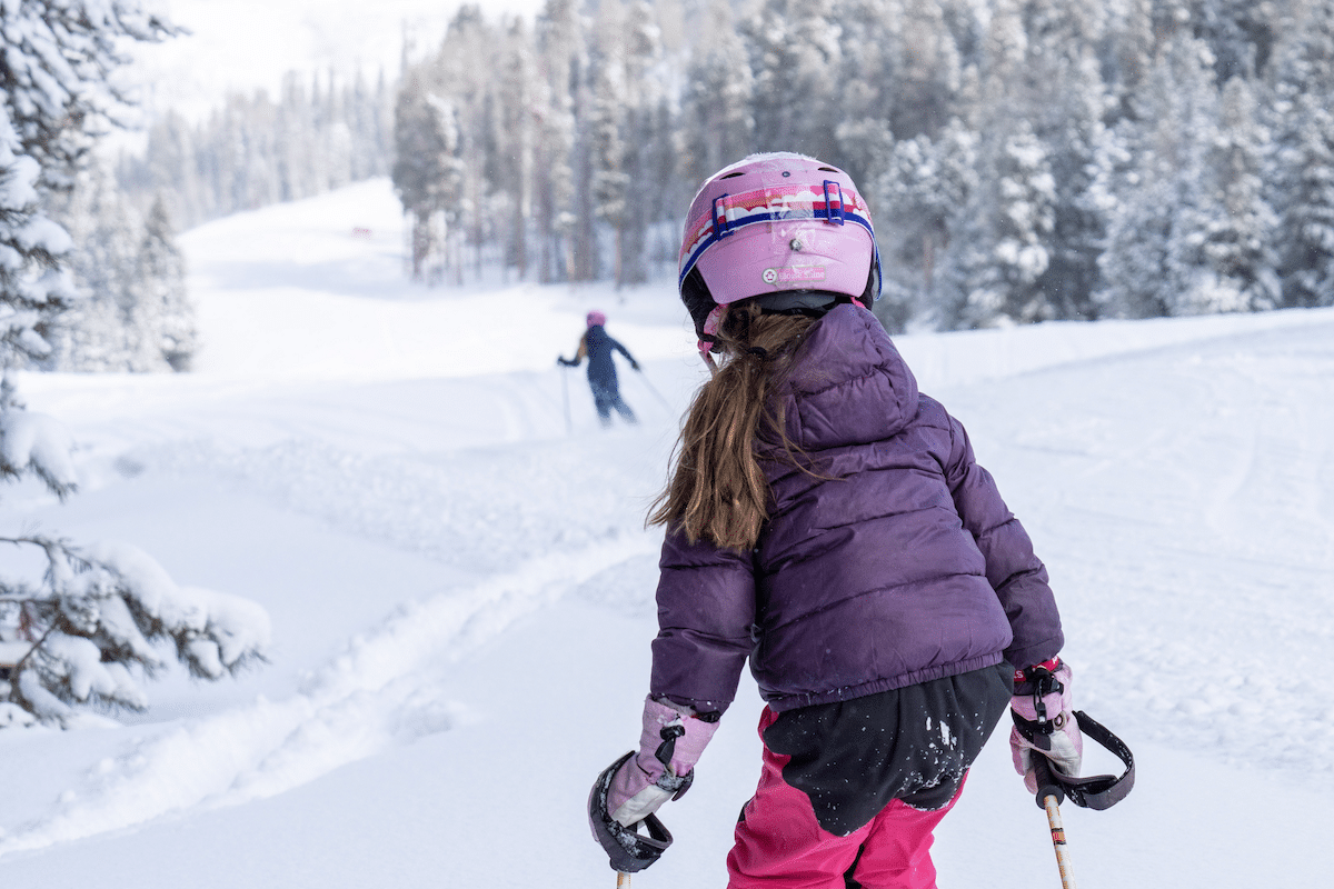 Young girl skiing down Dipsy Doodle Ski Run on Aspen Mountain, Aspen Snowmass