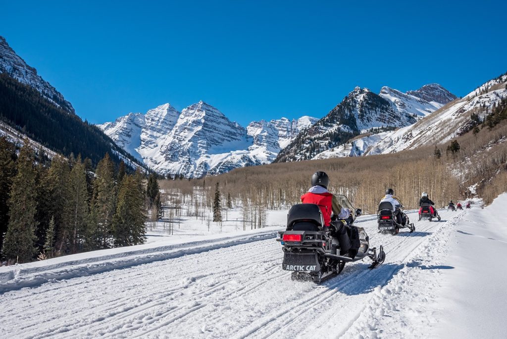 Snowmobiling on Maroon Creek Road Aspen, Colorado