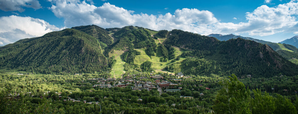 Aspen downtown in summer with Aspen Mountain in view