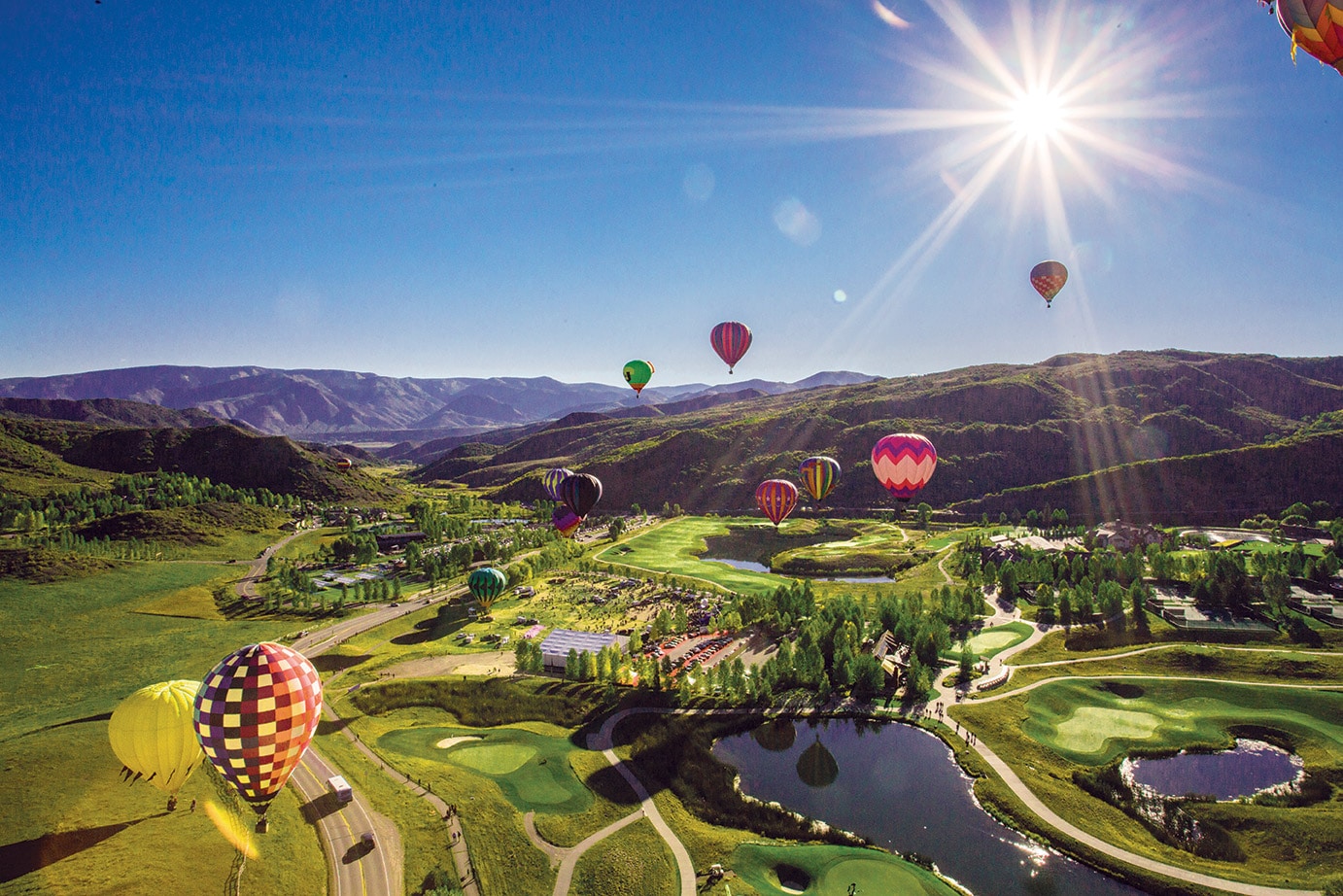 Snowmass Village in autumn with hot air balloons